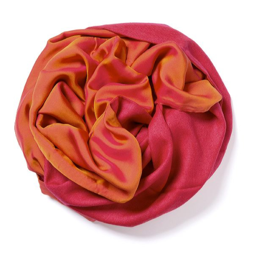 Raspberry colored Pashmina  with raspberry-orange changeant silk satin attached on one side of the scarf